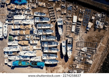 Aerial view of boat hulls under construction at a shipbuilding industry site