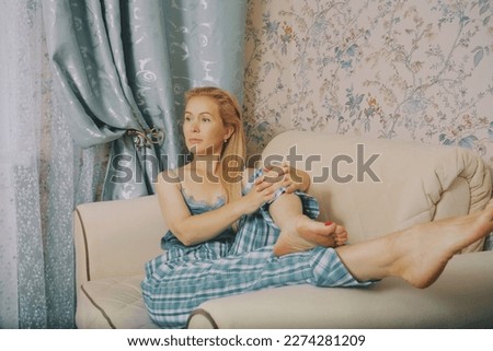 Middle aged woman sitting in bedroom interior enjoy good morning