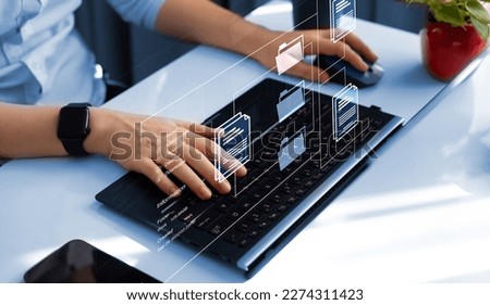 Document Management System or DMS.Automation software to archiving and efficiently manage and information files.Consultant information technology (IT) working on laptop. Royalty-Free Stock Photo #2274311423