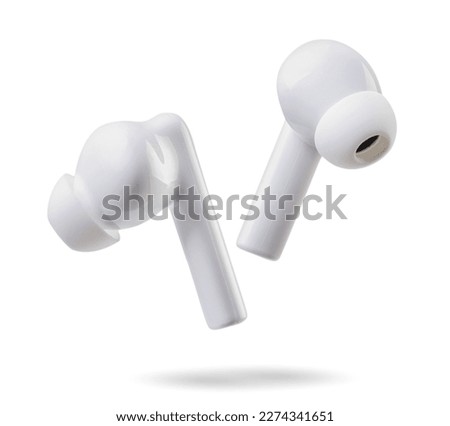 Wireless headphones fly close-up on a white background. Isolated