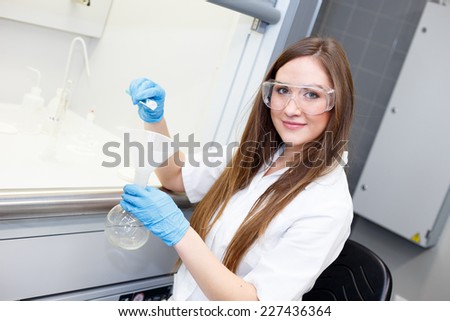 Female chemist in work