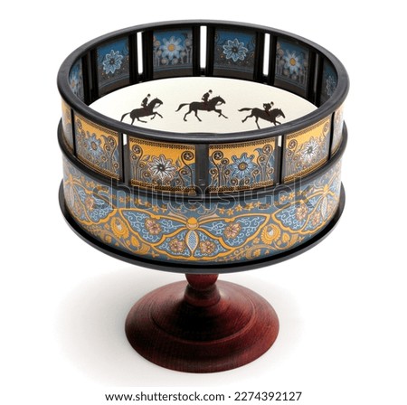 Photograph of a zoetrope on a white background