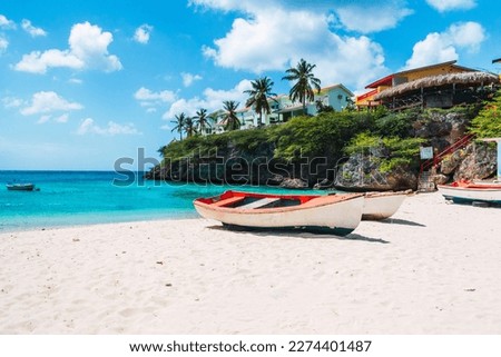 boat in the beach, Lagun Beach,  in the caribbean island of curacao, landscape with  Copyspace Royalty-Free Stock Photo #2274401487