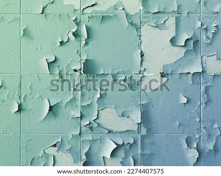 Texture, pattern, background. old paint. Concrete wall cracked paint, paint abstractly behind the concrete. With white tone paint flakes off over time. Peeling painted wall background.