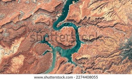 Colorado River, Lake Powell and Trachyte Canyon looking down aerial view from above – Bird’s eye view Colorado River, Utah, USA Royalty-Free Stock Photo #2274408055