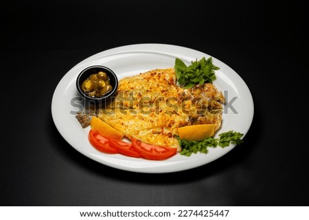 Fish Fried isolated on black background