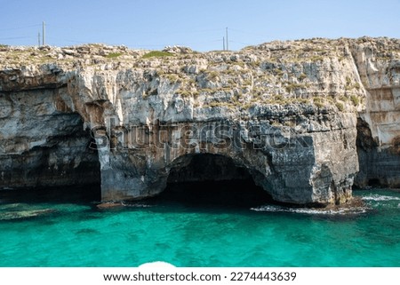 the caves of Salento coast at Santa Maria di Leuca, Apulia regio Royalty-Free Stock Photo #2274443639
