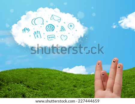 Happy cheerful smiley fingers looking at cloud with blue social icons and smybols