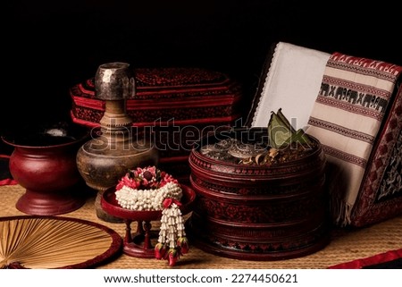 Lanna-style wooden bowls used for welcoming guests Royalty-Free Stock Photo #2274450621