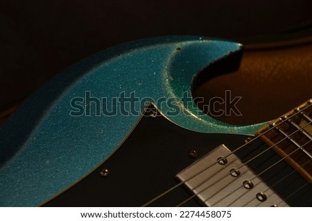 Vintage Blue Sparkle Electric Guitar Closeup