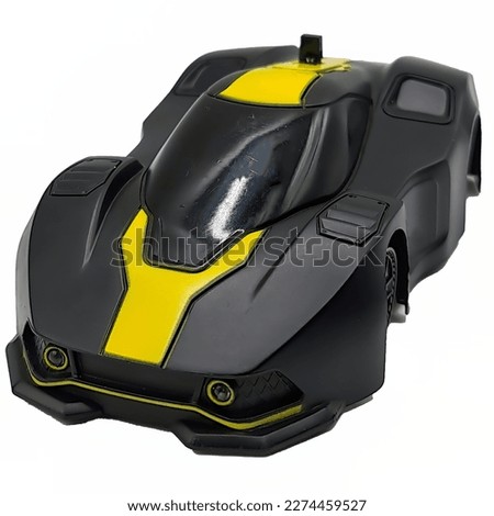 RC toy car black and yellow front and side view isolated on white background Royalty-Free Stock Photo #2274459527