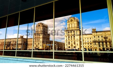 Reflection of the city on the station square