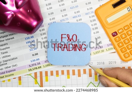 F and O Future and Option Trading inscription on notepad with calculator.