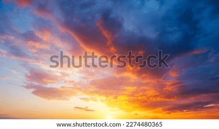 Utterly spectacular sunset with colorful clouds lit by the sun. Scenic image of textured sky. Perfect summertime wallpaper. Bright epic sky. Photo of dramatic evening light and fiery orange sunset. Royalty-Free Stock Photo #2274480365
