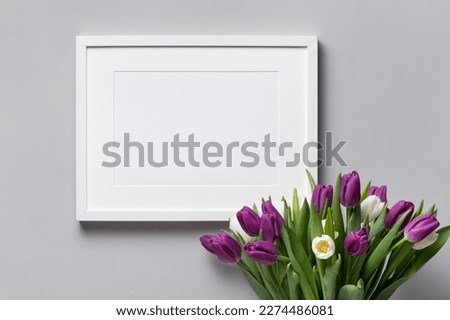 Landscape white frame mockup with fresh tulips flowers bouquet, blank mock up with copy space