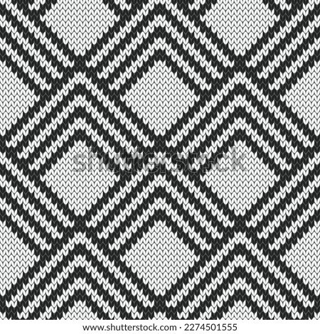 Black and white knitted jacquard seamless pattern. Art deco style. Geometric vector illustration. Royalty-Free Stock Photo #2274501555