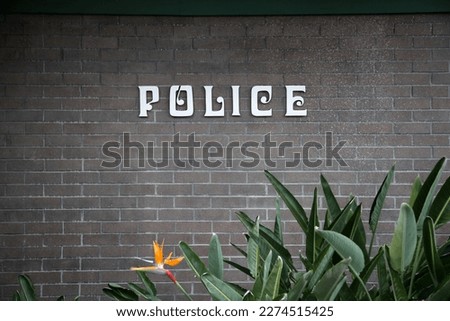 POLICE. Police Sign on a wall. Police department. Police do an important job helping to keep people safe and secure from Crime and Terror. 