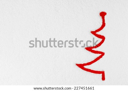 Christmas tree painted on frozen window