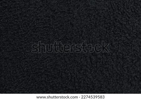 Black bubble foamy background texture close up view