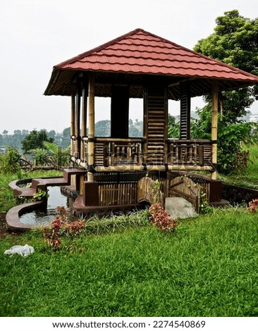 beautiful and simple bamboo gazebo with pond