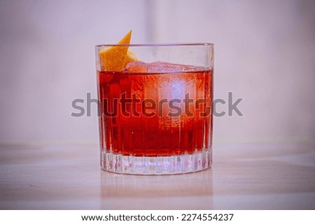 Refreshing negroni drink in elegant glass Royalty-Free Stock Photo #2274554237