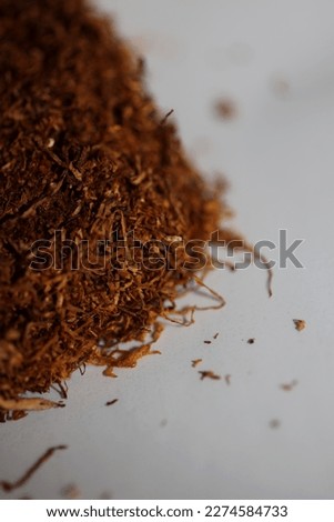 Rolling tobacco close up background big size high quality stock photos smoking self made cigarettes and joints