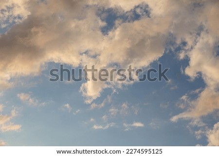 Thunderclouds in the sky at sunset. Background