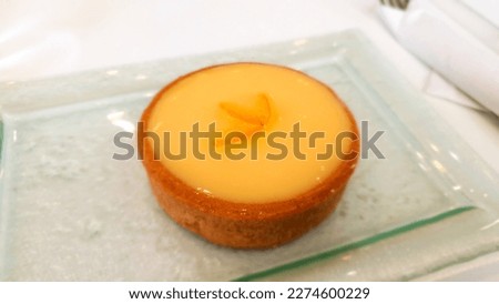 Lemon pie or Tarte au citron in a pastry shop in Paris.