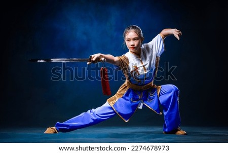 Chinese girl with Chinese martial arts concept. Royalty-Free Stock Photo #2274678973