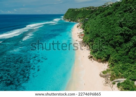 Paradise beach with turquoise ocean in Bali. Aerial view Royalty-Free Stock Photo #2274696865