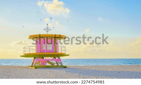 Lifeguard hut on the beach in Miami Florida, colorful hut on the beach during sunrise Miami South Beach. Sunny day on the beach Royalty-Free Stock Photo #2274754981