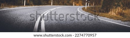 Asphalt road panorama in countryside on sunny summer day. Royalty-Free Stock Photo #2274770957