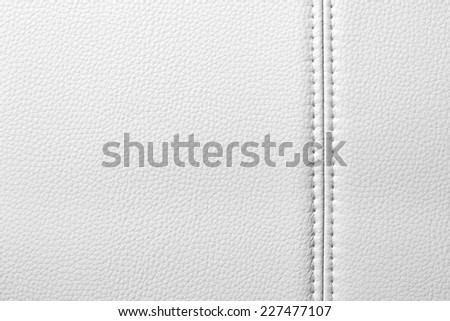 Texture of white leather, seam, close-up Royalty-Free Stock Photo #227477107