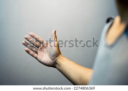 Violence. Focus on hand about to slap. Royalty-Free Stock Photo #2274806369