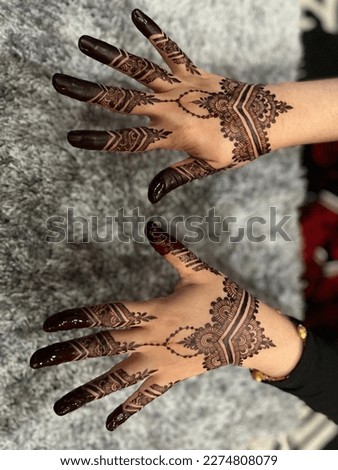 Simple henna design for wedding Royalty-Free Stock Photo #2274808079