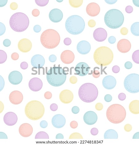 Multi colored circle shapes or spheres seamless pattern of pastel yellow, purple, blue, pink color. Gentle baby print. Vector illustration for fabric, wallpaper or wrapping paper design.
