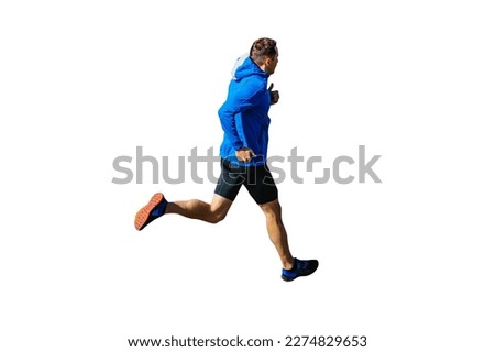 male runner in blue windbreaker and black tights running, cut silhouette on white background, sports photo