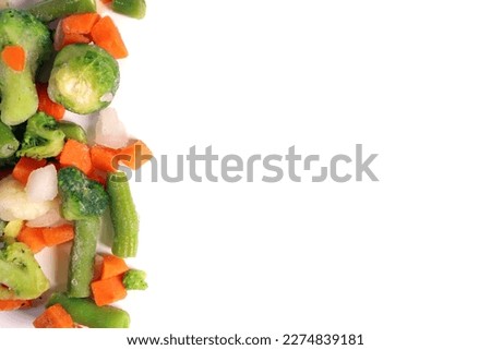fresh frozen vegetables including broccoli, celera, onion, broccoli on white background