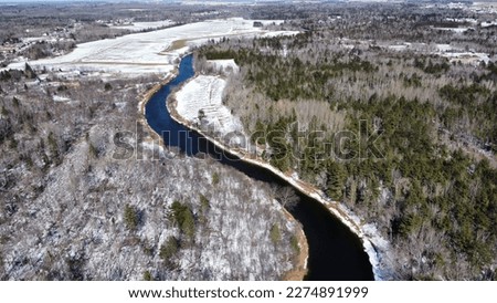 Aerial drone shot of beautiful bridge, landscape and river