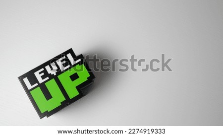 Word: ''Level up'' cube with a with background and space for text Royalty-Free Stock Photo #2274919333