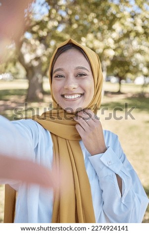 Muslim, woman in park with hijab and selfie, freedom and travel, nature with peace and calm outdoor. Islamic fashion, youth and gen z with adventure, lifestyle and female in Dubai smile in picture