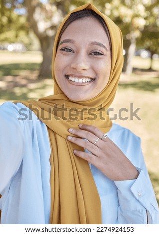 Muslim, young woman and selfie with hijab outdoor, happy influencer with travel blog, freedom in nature and vacation. Islamic fashion, gen z youth and female smile in picture in Dubai with memory