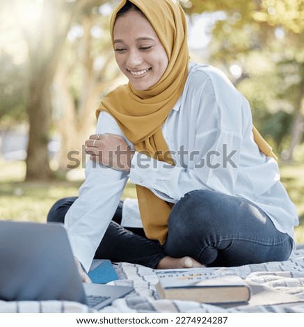 Student, muslim and woman with laptop in park for elearning, studying or knowledge research. Islamic college, education scholarship and happy female with computer for internet browsing in university.