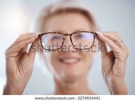 Optometry, vision and senior woman with glasses for eye care, health and wellness in clinic. Healthcare, ophthalmology and portrait of elderly female with spectacles prescription lens in optic store. Royalty-Free Stock Photo #2274924441