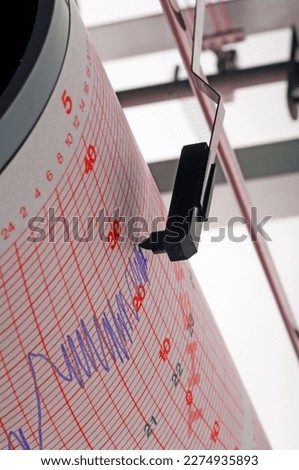 A seismograph is a measuring instrument equipped with a ground motion sensor. Royalty-Free Stock Photo #2274935893