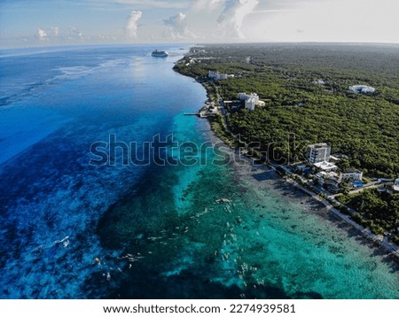 High view of cozumel island during the iron man competition. Big cruise in the background