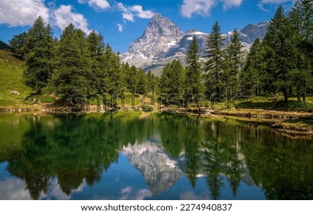 View of a beautiful mountain lake. Mountain lake reflection. Beautiful mountain lake. Mountain lake landscape Royalty-Free Stock Photo #2274940837
