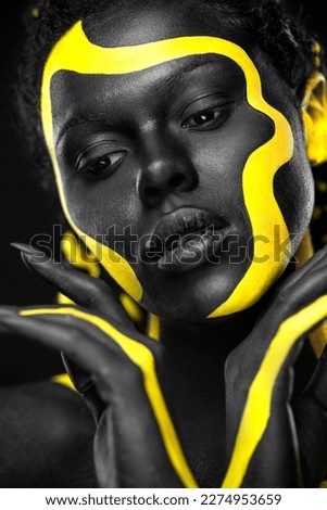 The Art Face. How to make a mixtape cover design - download high resolution picture with black and yellow body paint on african woman for your Music Song. Create album template with creative image.