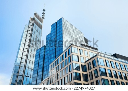 Modern office building in Warsaw, Poland. Skyscrapers facade in city. Business center exterior Royalty-Free Stock Photo #2274974027