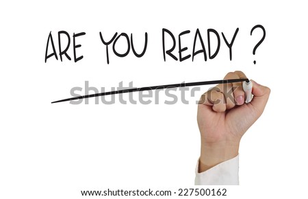 Motivational concept image of a hand holding marker and write Are you ready isolated on white